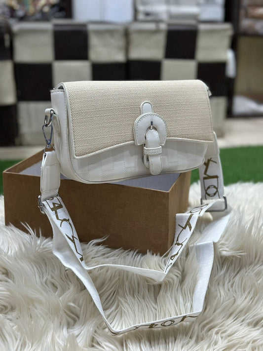 Elegant egg white women’s crossbody shoulder bag with textured fabric and buckle closure